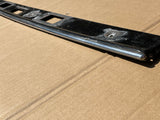 Daimler Jaguar XJ40 Sovereign Tactile trim panel (covers the number plate lamps on the boot lid).