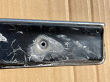 Daimler Jaguar XJ40 Sovereign Tactile trim panel (covers the number plate lamps on the boot lid).