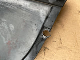 Jaguar XJ40 86-92MY left side lower front valance fill piece, wheel arch baffle BEC11049