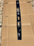 Daimler Jaguar XJ40 Sovereign Tactile trim panel (covers the number plate lamps on the boot lid).