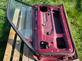 Jaguar X300 Drivers Right Side Front Door Stripped shell. CFH Flamenco Red
