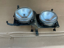 Jaguar XJ40 left quad lamp assembly frame and lights (no bezel surround). RHD