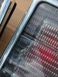 Daimler Jaguar XJ40 Smoked Grey Rear Lamps Tail Lights set With chrome surround.